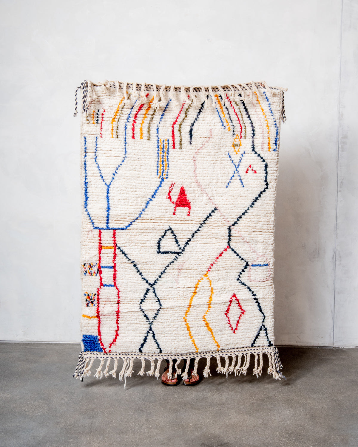 Modern, designer, handcrafted Berber rug from Morocco. Beniourain carpet with beautiful colours and patterns and fluffy wool texture.
